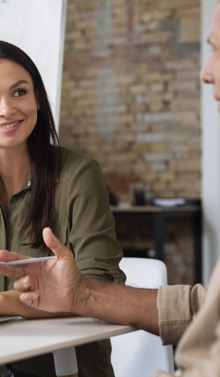 people-using-digital-device-while-meeting